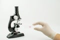 Microscope on white background and bacteria virus