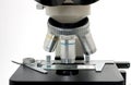 Microscope on white Royalty Free Stock Photo