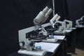 Microscopes set on the worktable of the school lab Royalty Free Stock Photo