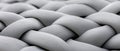 Microscopic view of interwoven nanoscale filaments creating a textured gray material surface, suggesting advanced nanotechnology Royalty Free Stock Photo