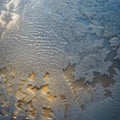 A microscopic view of intricate patterns formed by frost on a window pane during a cold winter morning2