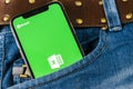 Microsoft Exel application icon on Apple iPhone X screen close-up in jeans pocket. Microsoft office Exel app icon. Microsoft offic