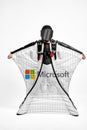 Microsoft. Men in wing suit equipment.Demonstration of popular brands. Simulator of free fall.