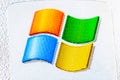 Microsoft Windows XP, Windows 7 operating system logo, brand symbol sticker label macro, extreme closeup, detail Royalty Free Stock Photo