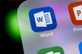 Microsoft word application icon on Apple iPhone X screen close-up. Microsoft office word icon. Microsoft office on mobile phone.