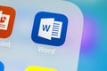 Microsoft word application icon on Apple iPhone X screen close-up. Microsoft office word icon. Microsoft office on mobile phone.