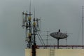 Microwave antenna tower on blue sky background Royalty Free Stock Photo