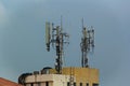 Microwave antenna tower on blue sky background Royalty Free Stock Photo