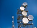 Microwave communication dishes on a tower on the hill of the Ward of Scousburgh in southern Shetland, UK Royalty Free Stock Photo