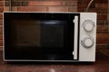 microwave in the kitchen,kitchen brickwork is white microwave Royalty Free Stock Photo