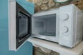 Microwave oven with opened door Royalty Free Stock Photo