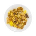 Microwaved potatoes eggs and steak with cheddar cheese breakfast Royalty Free Stock Photo
