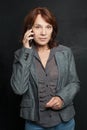 Mid adult business woman cell phone Royalty Free Stock Photo