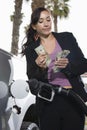 Mid Adult Business Woman Counting Money Royalty Free Stock Photo