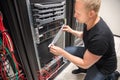 Engineer Checking Computer Server In Datacenter Royalty Free Stock Photo