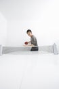 Mid adult man playing table tennis Royalty Free Stock Photo