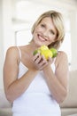 Mid Adult Woman Holding Fresh Fruit