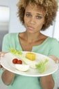 Mid Adult Woman Holding A Plate Of Healthy Food Royalty Free Stock Photo