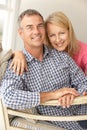 Mid age couple at home Royalty Free Stock Photo