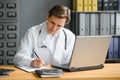 Mid age female doctor writing prescription Royalty Free Stock Photo