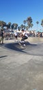 Mid air skate boarder on e beautiful day