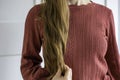 Mid-body of a woman with long hair Royalty Free Stock Photo