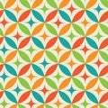 mid century atomic starbursts on colorful circles seamless pattern in green, teal, red and orange