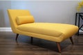 mid-century modern chaise lounge, with sleek lines and comfortable padding