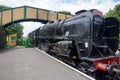 A train as it enters a station at the Mid Hants steam railway