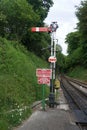 Mid Hants steam railway signal at the end of a platform