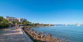 Mid morning sun on the beach city. Warm sunny day along the beach in Ibiza, St Antoni de Portmany Balearic Islands, Spain Royalty Free Stock Photo