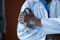 Male doctor standing with arms crossed in the hospital Royalty Free Stock Photo