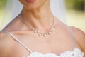 Mid section of a beautiful bride wearing a necklace Royalty Free Stock Photo