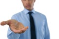 Mid section of businessman extending hand