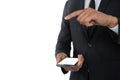 Mid section businessman gesturing while holding mobile phone