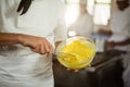 Mid section of chef mixing dough Royalty Free Stock Photo