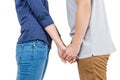 Mid section of couple holding hands