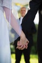 Mid section of couple holding hands Royalty Free Stock Photo