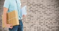 Mid section of delivery man holding parcel box and clipboard Royalty Free Stock Photo