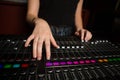 Mid-section of female audio engineer using sound mixer Royalty Free Stock Photo