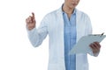 Mid section of female doctor using digital screen while holding clipboard Royalty Free Stock Photo