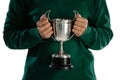 Mid section of female rugby player holding trophy Royalty Free Stock Photo