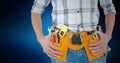 Mid section of handyman with tool belt around his waist Royalty Free Stock Photo