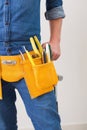 Mid section of a handyman with toolbelt Royalty Free Stock Photo
