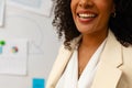 Mid section of happy african american casual businesswoman making presentation in office Royalty Free Stock Photo