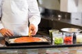 Mid section of a male chef preparing pizza Royalty Free Stock Photo