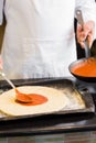 Mid section of a male chef preparing pizza Royalty Free Stock Photo