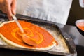 Mid section of a male chef preparing pizza Royalty Free Stock Photo