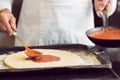 Mid section of a male chef preparing pizza Royalty Free Stock Photo