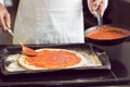 Mid section of a male chef preparing pizza Royalty Free Stock Photo